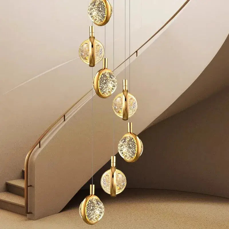Suspension Cascade Dorée à Disques Cristal Design Luxueux