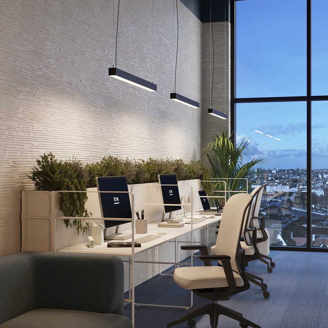 Suspension linéaire PINNE noir au-dessus d'un poste de travail