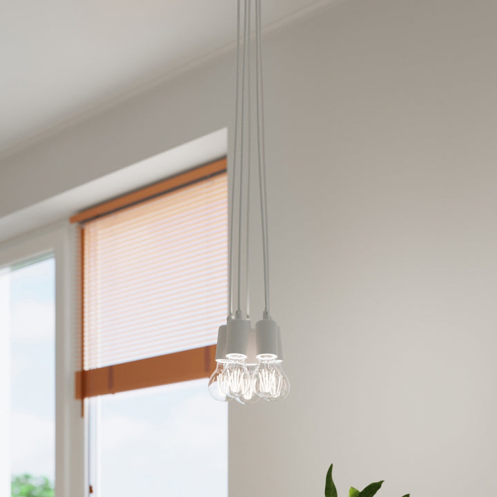 Suspension Luminaire blanc allumée, vue rapprochée