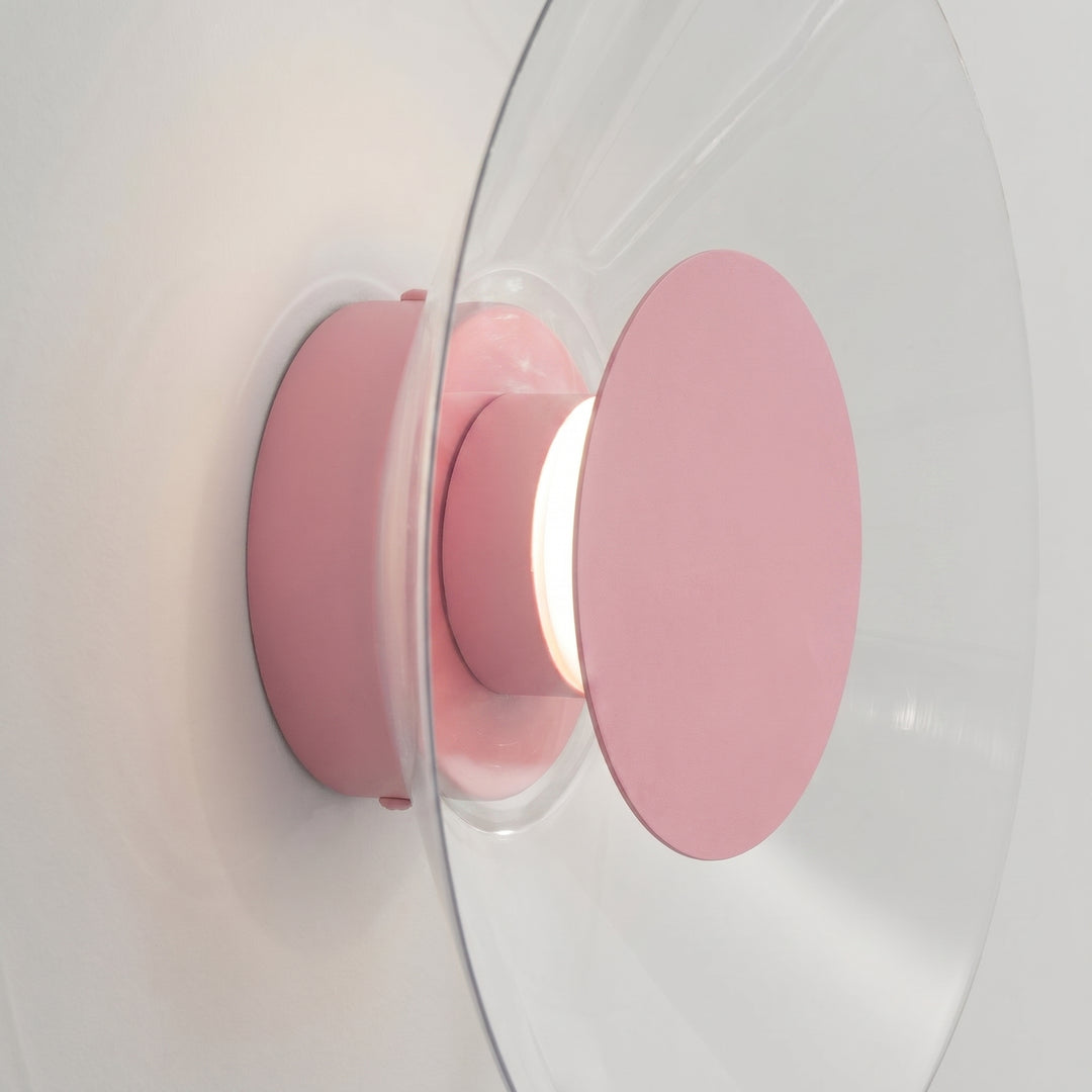 Applique murale ASTRO rose vue de profil, disque transparent