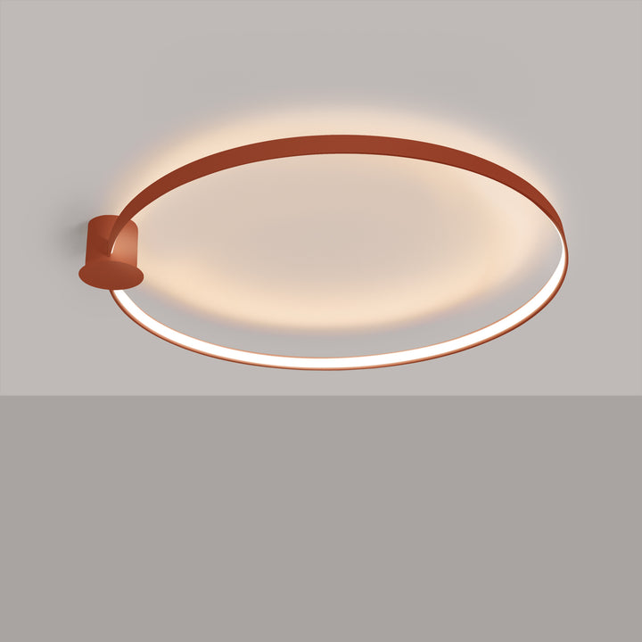 Plafonnier anneau RIO ocre rouge allumée, au plafond