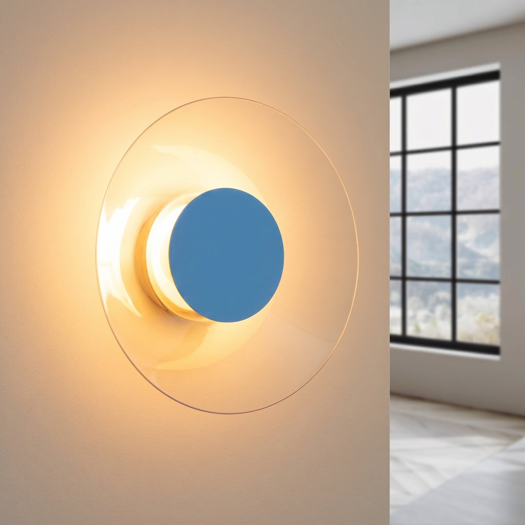 Applique murale ASTRO bleu clair allumée, halo derrière le disque