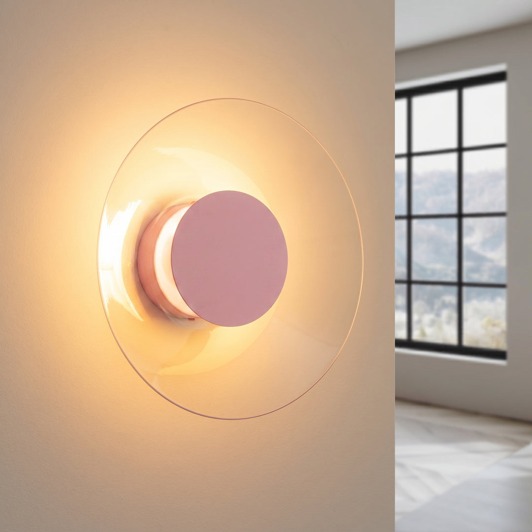Applique murale ASTRO rose allumée, halo derrière le disque