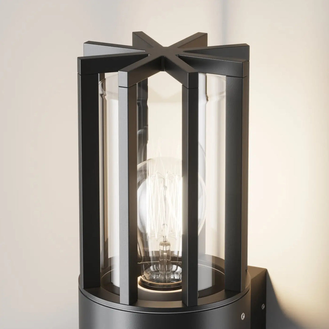 Applique extérieure barrel en métal graphite noir avec panneaux en verre transparent et sommet en forme d’étoile