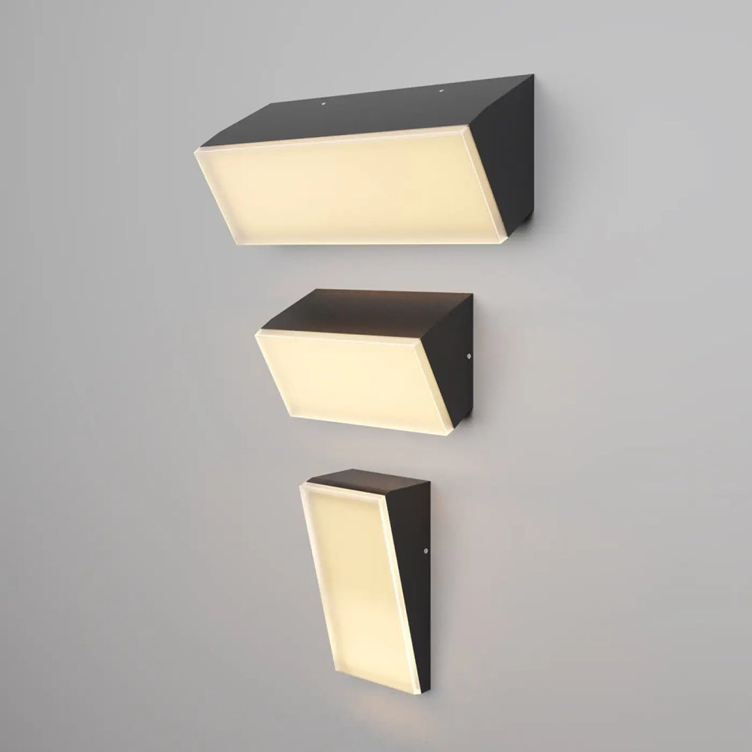 Applique extérieure brick rectangulaire en aluminium graphite noir avec éclairage chaud et diffus long d un passage