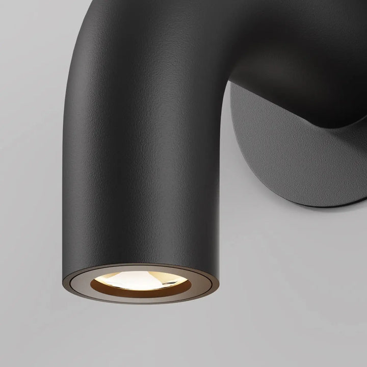 Applique extérieure led en aluminium noir avec finition mate et design incurvé élégant pour éclairage chaleureux