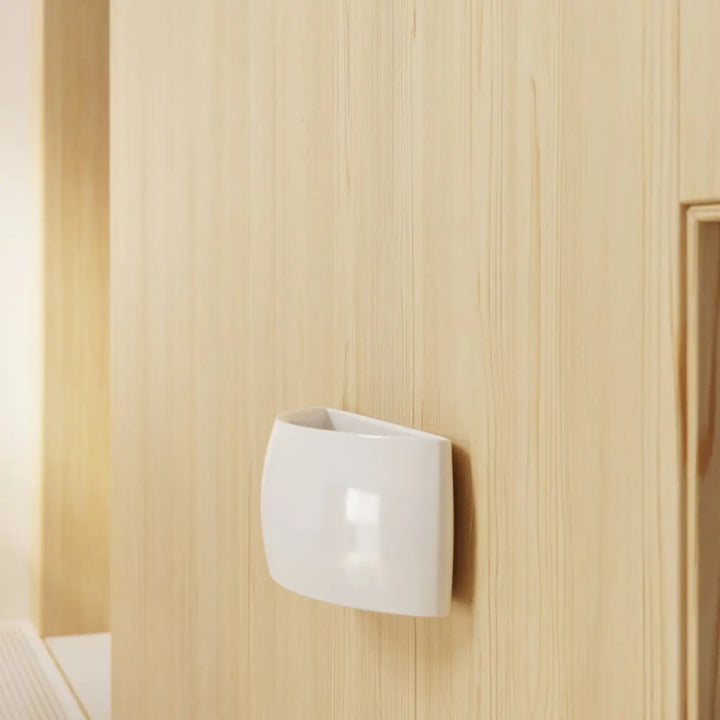 Applique murale pontius blanc en céramique avec design incurvé et lumière douce pour un mur élégant