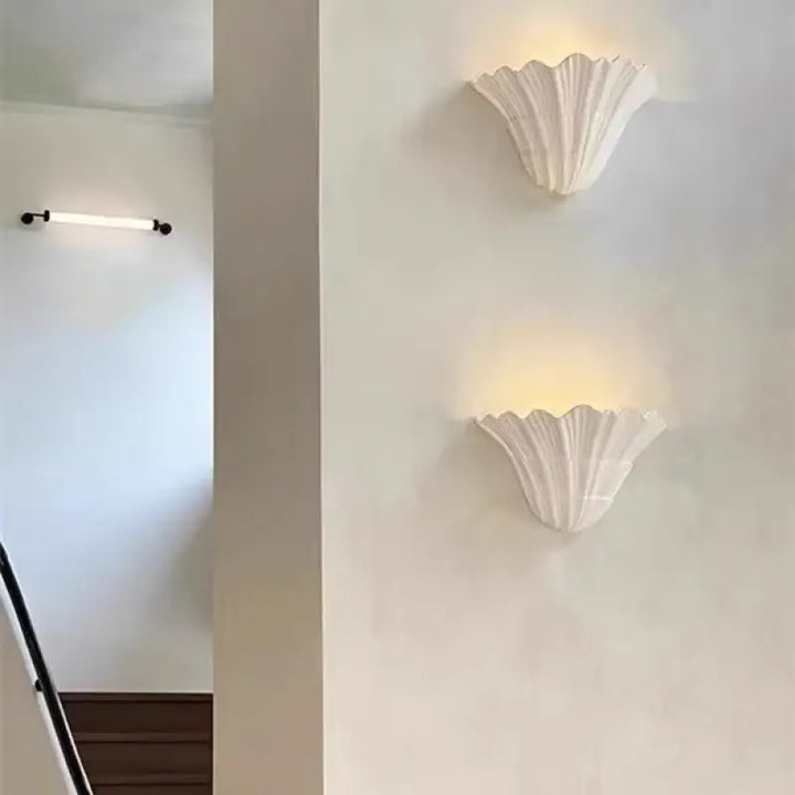 Applique murale blanche en forme de coquillage au style marin