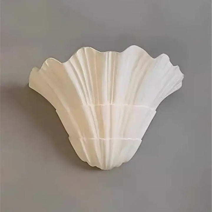 Applique murale blanche en forme de coquillage au style marin