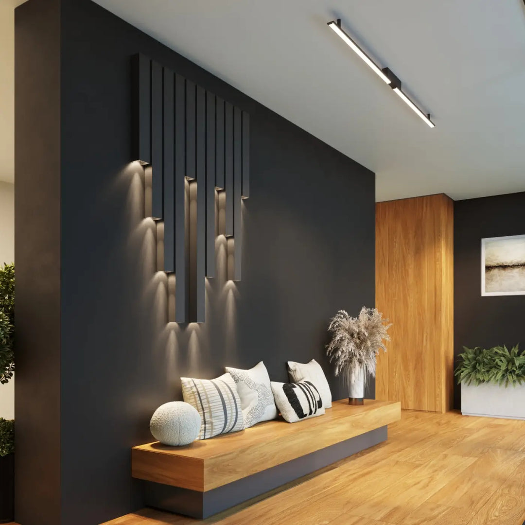 Applique murale noire moderne avec bandes led intégrées de la collection freya en cinq coloris montée sur mur sombre