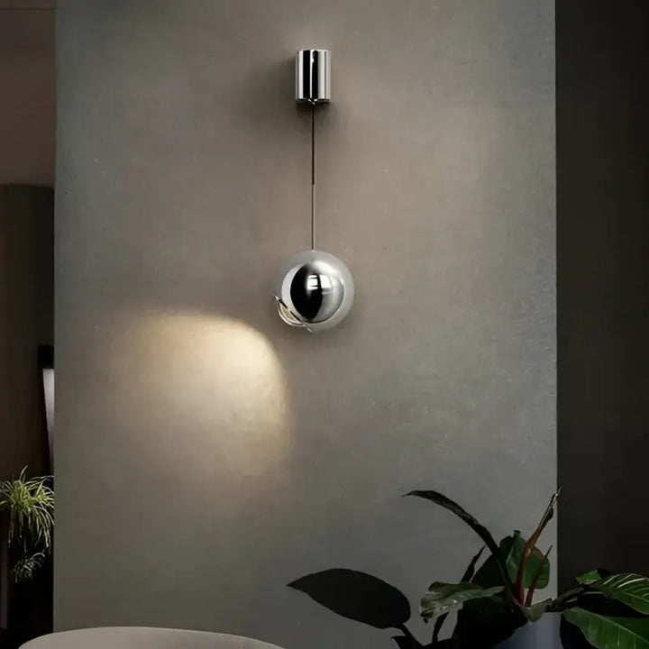Applique murale boule métal noir orientable style moderne