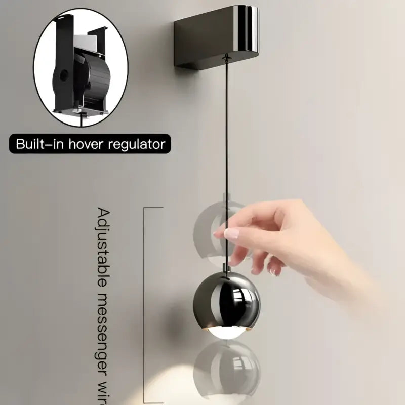 Applique murale boule métal noir orientable style moderne