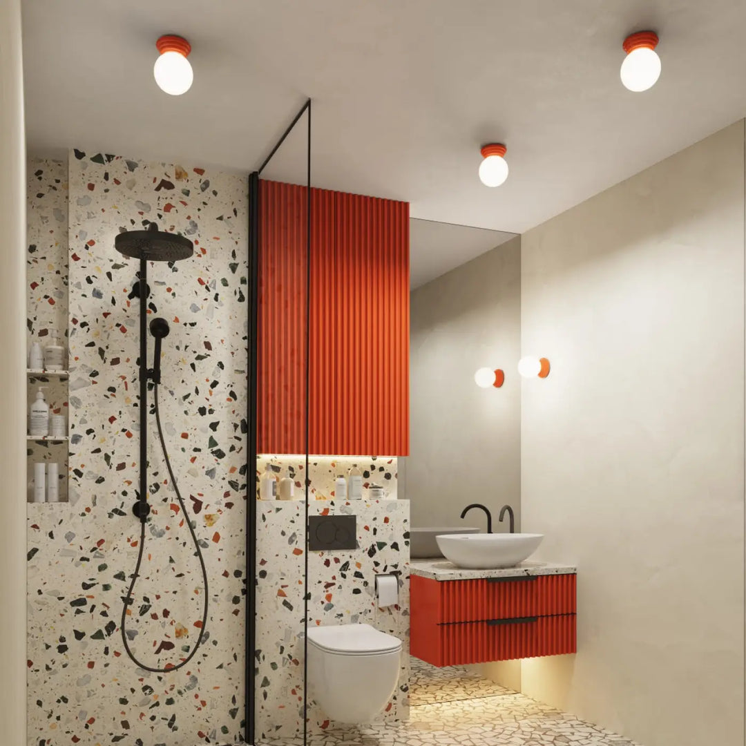 Applique murale lampe zori orange nervurée avec poignées noires et éclairage sous meuble pour belle décoration