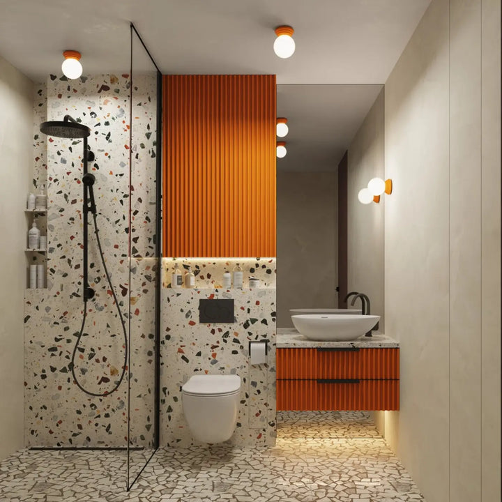 Applique murale orange dans une salle de bains