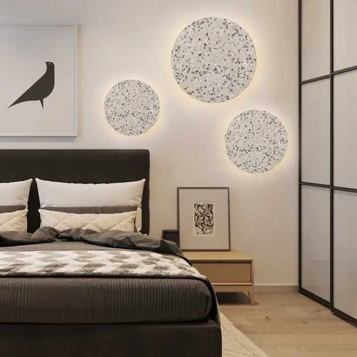 Applique murale circulaire LED à la texture de granité coloré

