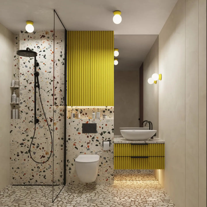 Applique murale jaune avec lavabo en céramique blanc et robinet noir offrant une belle décoration et qualités esthétiques