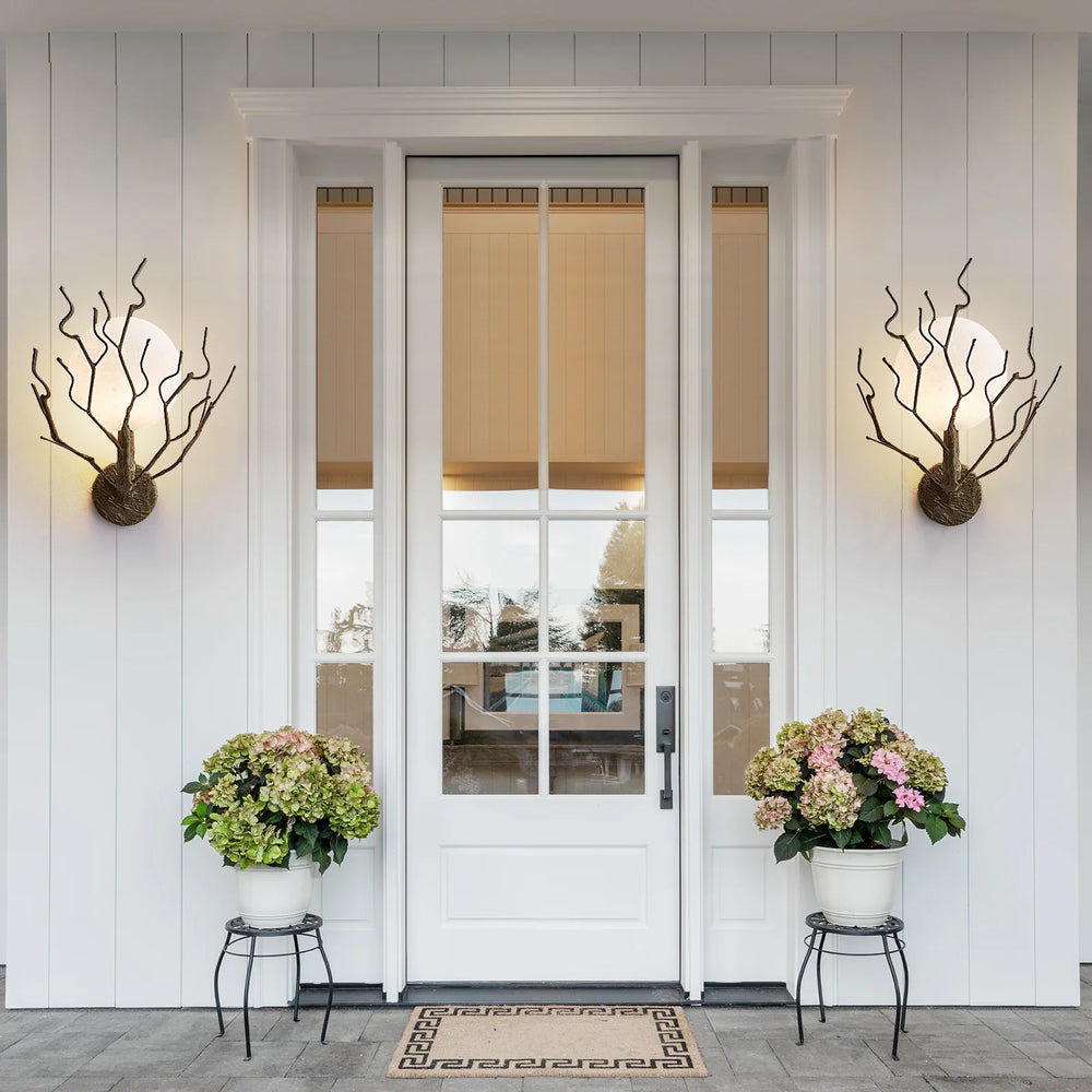 Applique murale design branches en métal et globe lumineux chic