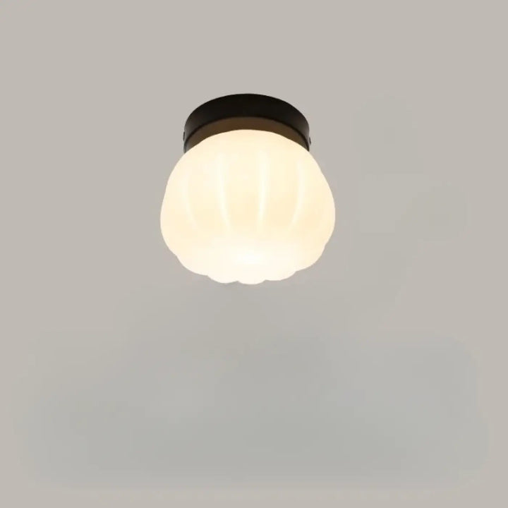 Applique murale puffo avec globe en verre dépoli à rayures verticales et base noire métal design doux et abat-jours arrondis