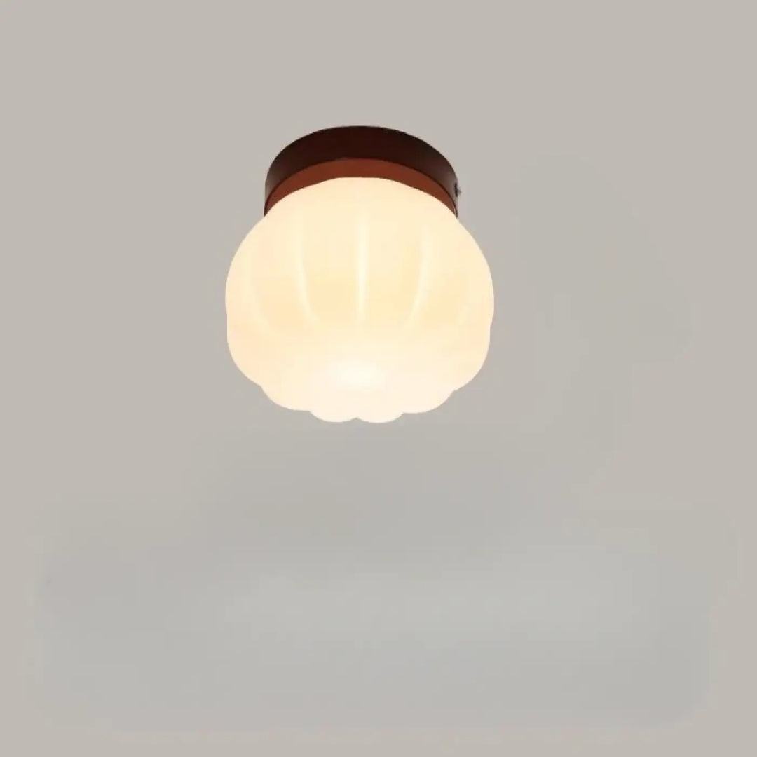 Applique murale puffo en verre dépoli chaud avec base métal brun et abat-jours arrondis au design doux murale