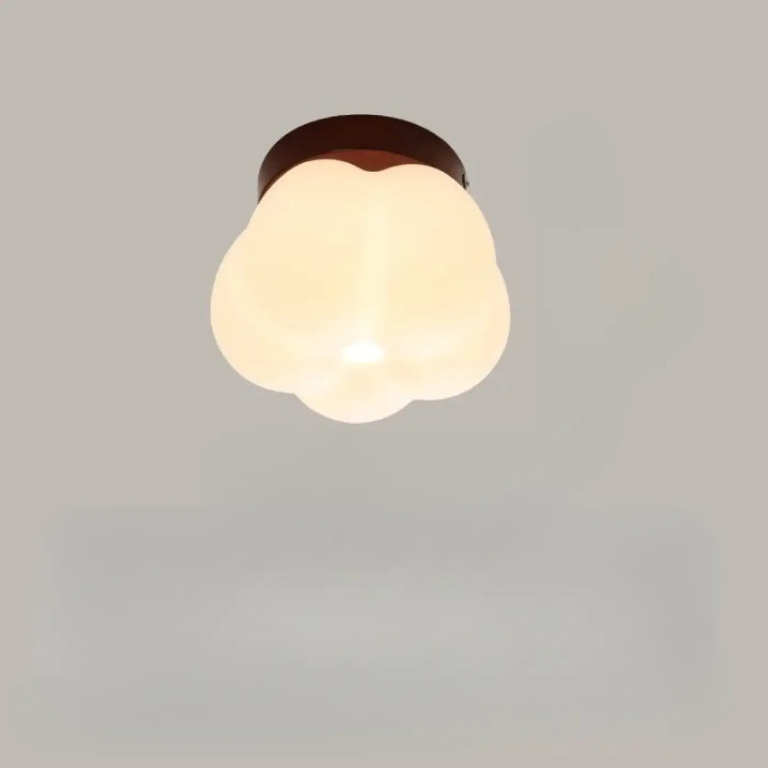 Applique murale puffo avec abat-jours arrondis en verre dépoli et anneau métallique brun foncé design doux chaleureux