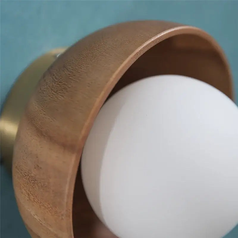 Applique murale design rond en bois et verre lumière douce