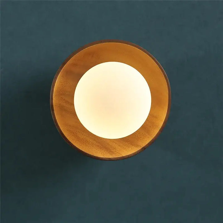 Applique murale design rond en bois et verre lumière douce