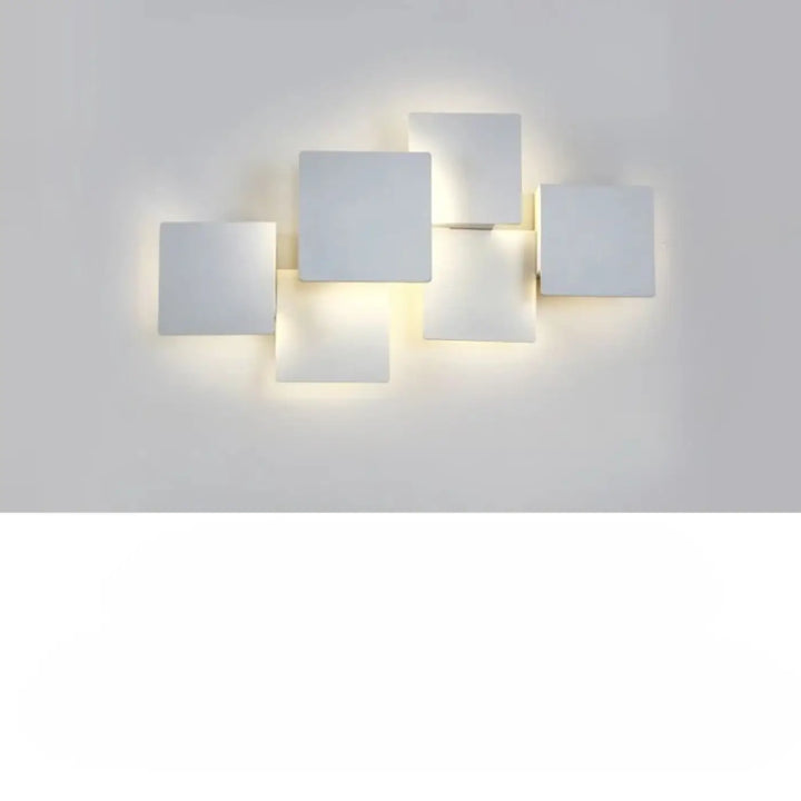 Applique murale kubora carrés flottants blanc moderne avec effet lumineux doux et design minimaliste