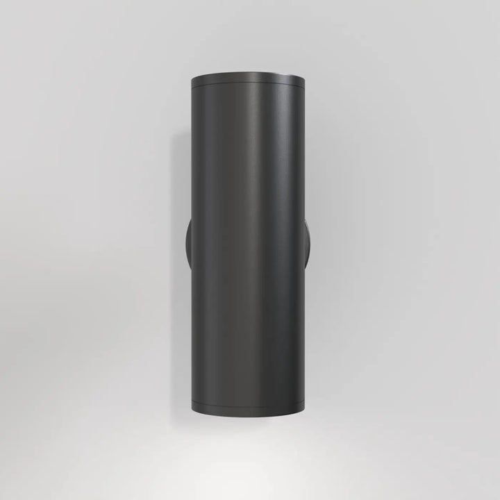 Matte black cylindre géométrique applique murale focus with sleek minimalist design, wall-mounted lighting fixture