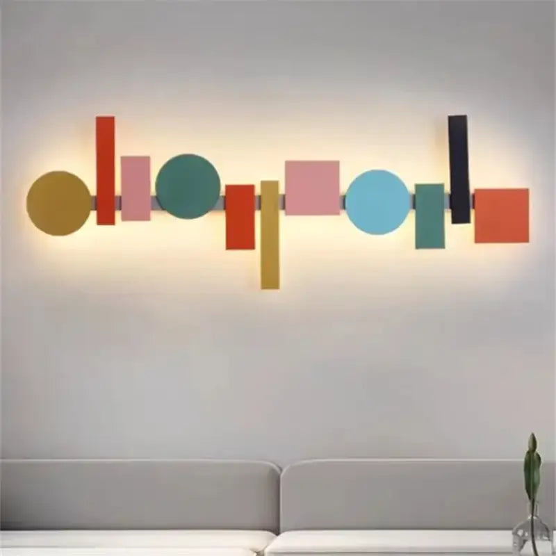 Applique murale géomatrique avec des carrés, ronds et rectangles

