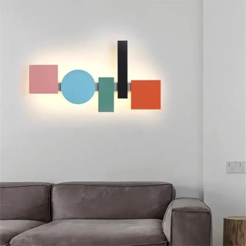 Applique murale géomatrique avec des carrés, ronds et rectangles

