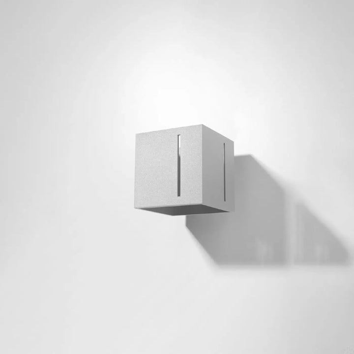 Applique murale pixar gris minimaliste en forme de cube blanc avec perforation linéaire verticale design moderne