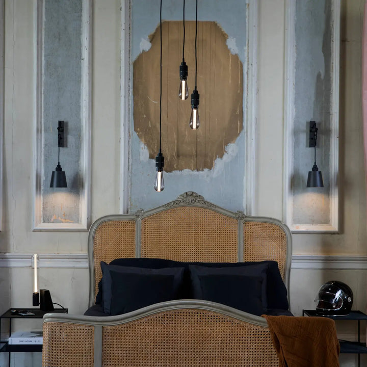 Luminaire Hooked dans une chambre #couleur_gris