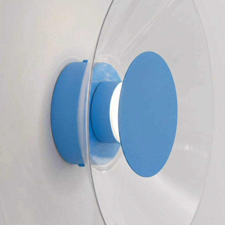 Applique murale ASTRO bleu clair vue de profil, disque transparent