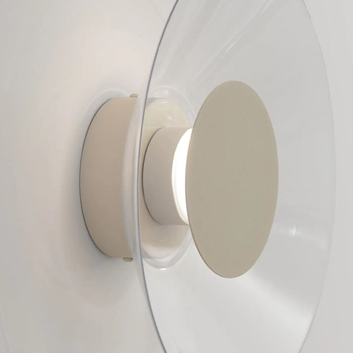 Applique murale ASTRO beige vue de profil, disque transparent