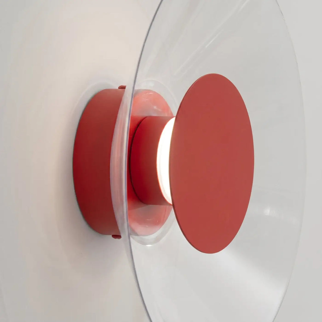 Applique murale ASTRO rouge vue de profil, disque transparent