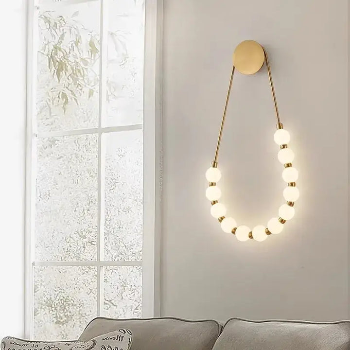 Applique murale led doré avec boules blanches style chic