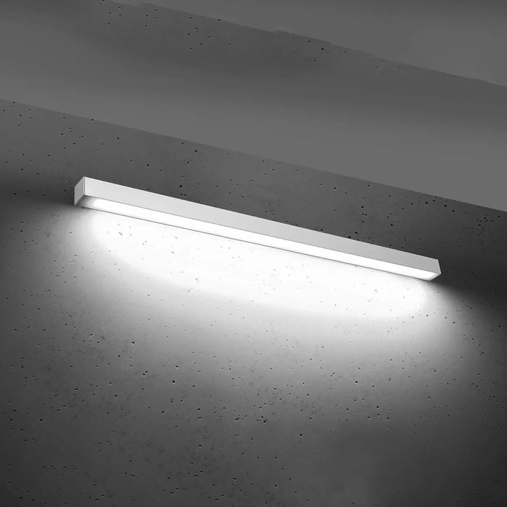 Applique murale linéaire PINNE blanc allumée, lumière vers le bas
