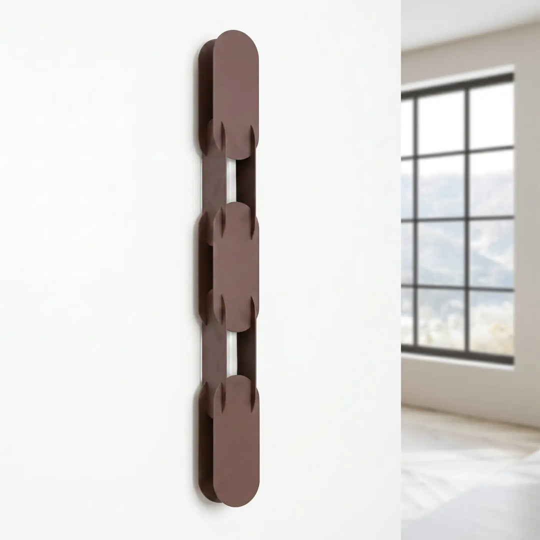 Applique murale CHAIN marron éteinte, posée au mur