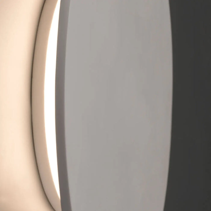 Détail de l'applique Luna en plâtre