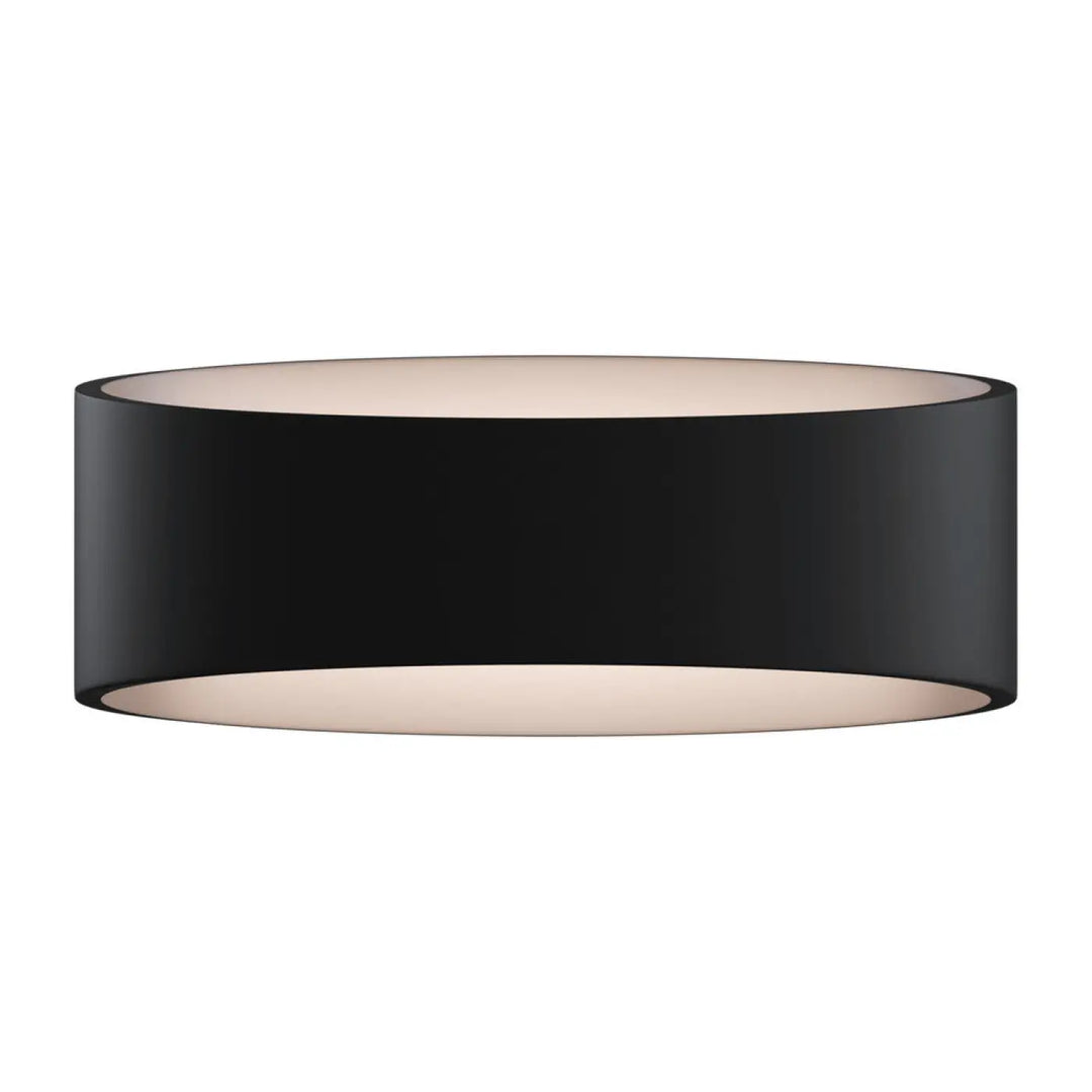 Applique murale trame elliptique noire cylindrique avec finition mate et lumière rasante intérieur beige doux