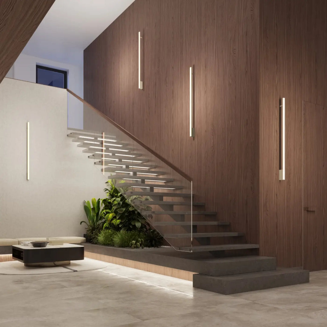 Applique murale LAGOM vert olive le long d'un escalier