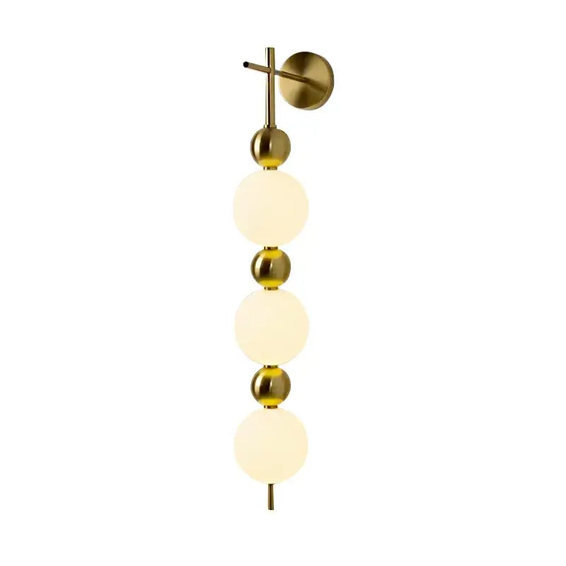 Applique murale moderne dorée pour chambre avec 3 boules

