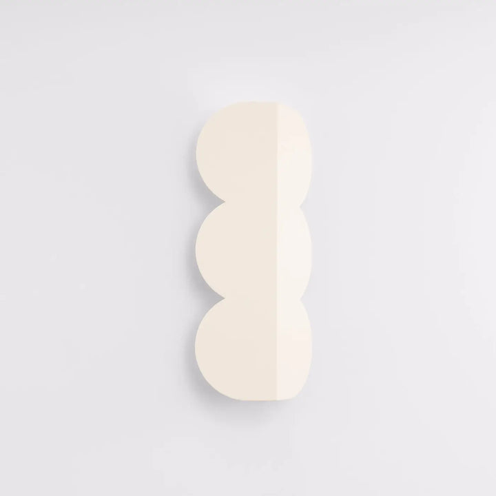 Applique murale BISCUIT beige éteinte, posée au mur