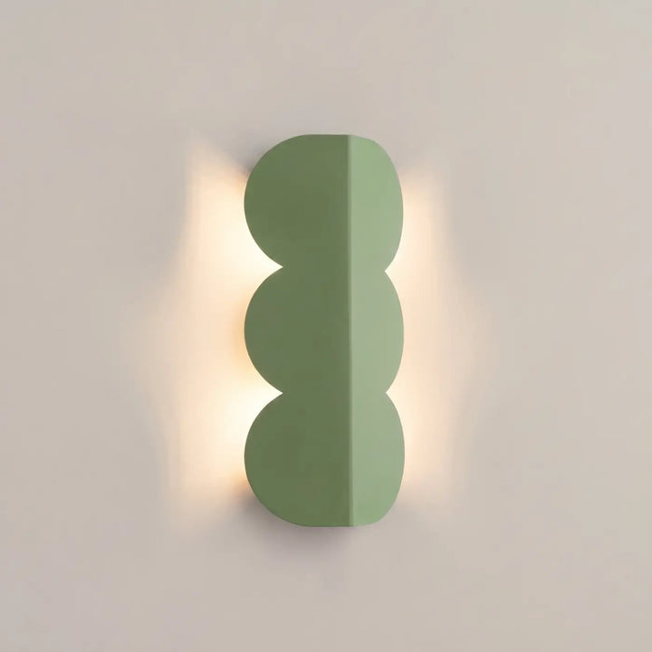 Applique murale BISCUIT sauge allumée, halo sur le mur
