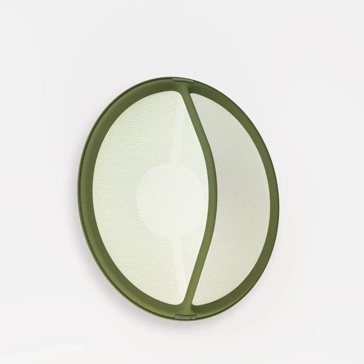 Olive green circular mesh strainer with reinforced frame in applique murale pantaya by patricia urquiola tricot tendu design