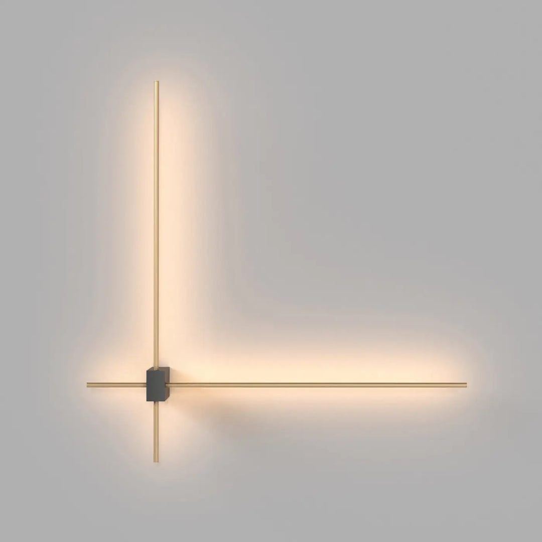 Applique murale pars avec tiges lumineuses croisées en métal doré émettant une lumière led douce et chaleureuse