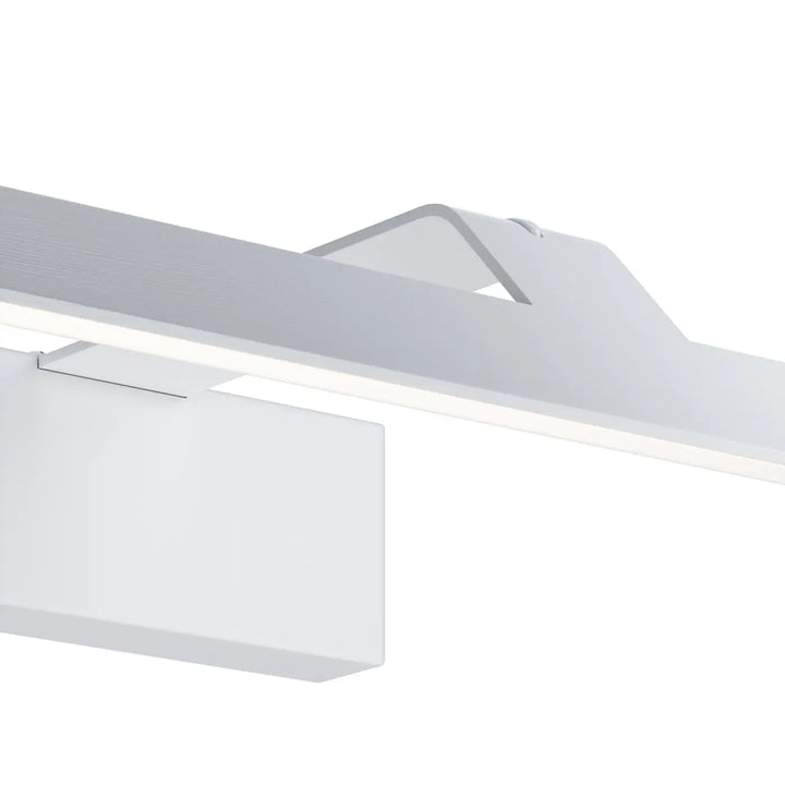 Applique murale decart en métal noir avec lumière neutre et bande led blanche moderne au-dessus d’un tableau