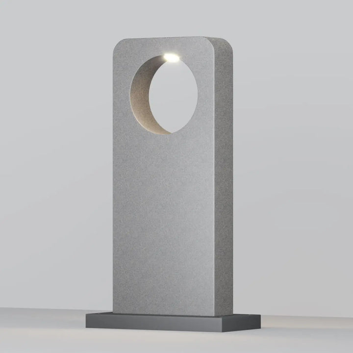 Borne extérieure en béton gris avec lampe de table circulaire intégrée led pour éclairage long d’une allée