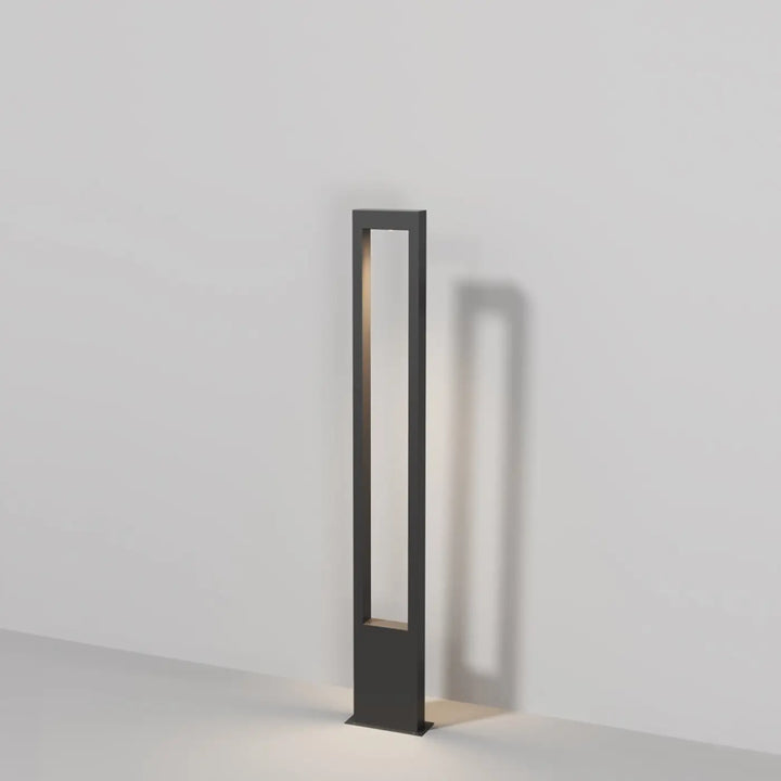 Borne extérieure arche rectangulaire en métal graphite noir avec lumière chaude centrale au design moderne et minimaliste