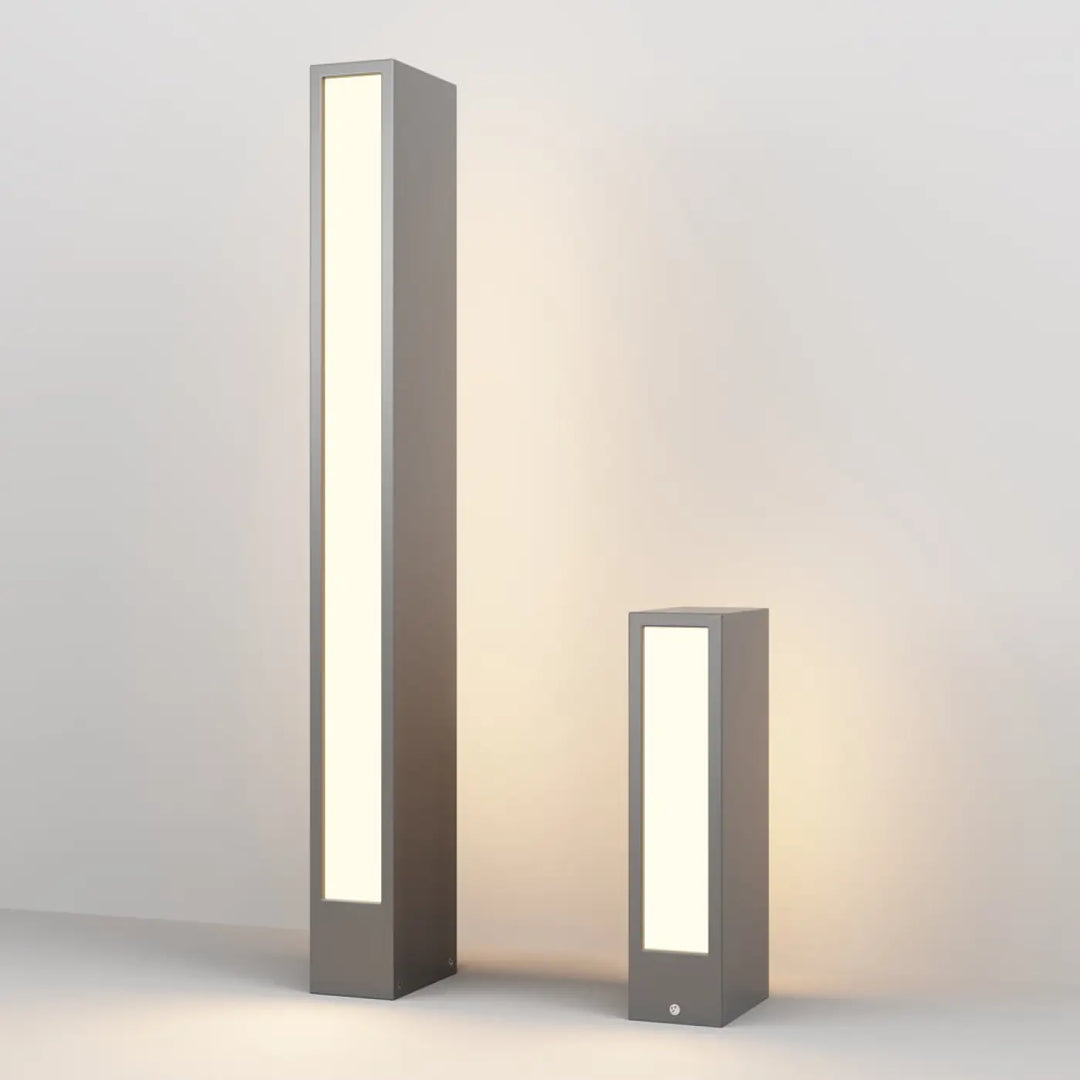 Borne extérieur hof rectangulaire en acier gris avec profil rectangulaire et version basse éclairage led moderne et chaleureux